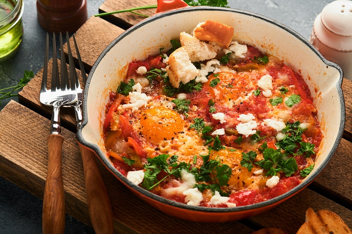 Shakshuka Homemade fried eggs poached in sauce of tomatoes